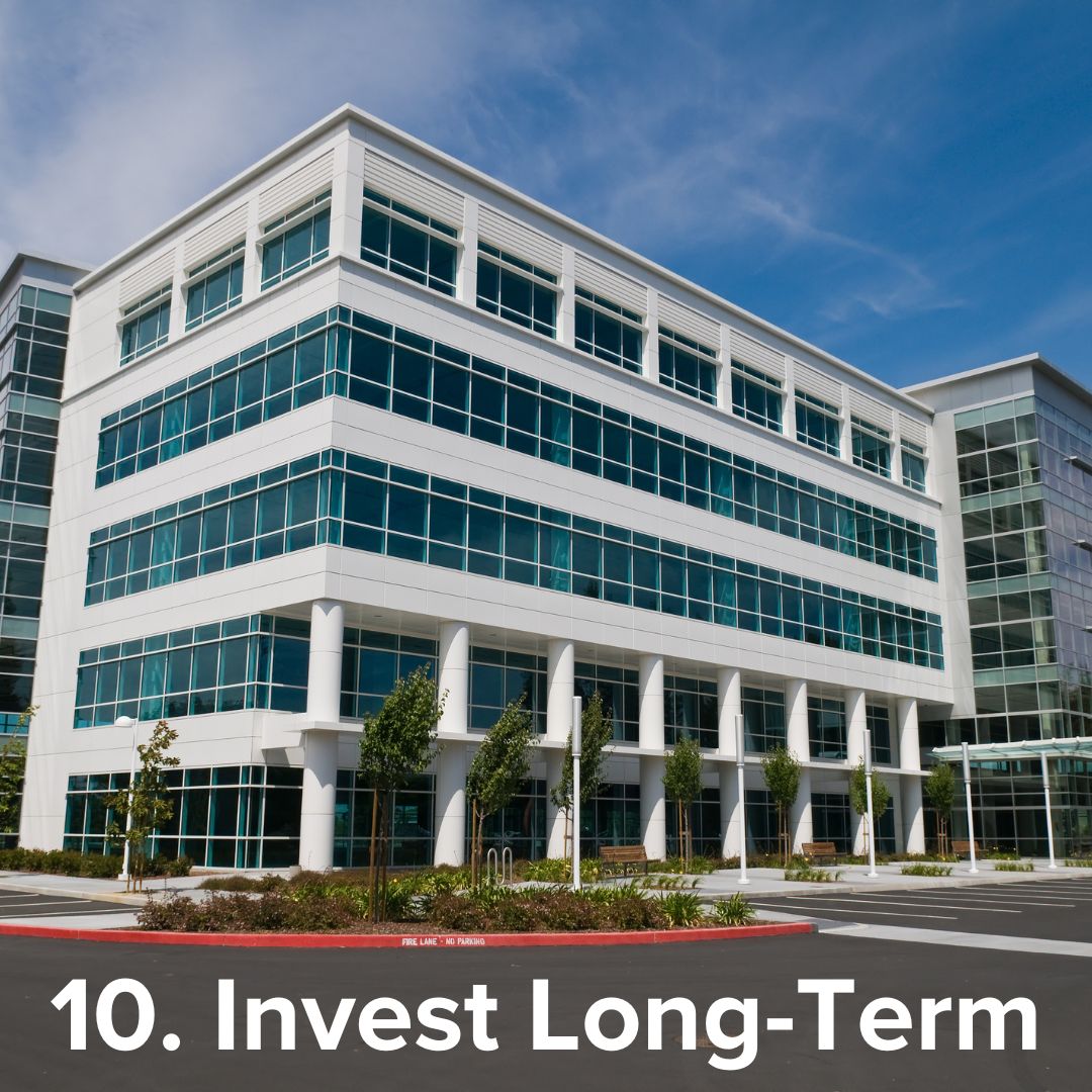 Large office building on a sunny day. The white title on the bottom says: '10. Invest Long-Term'