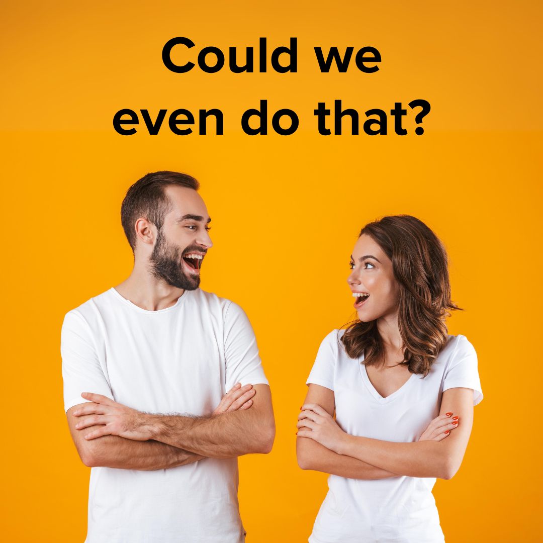 Orange background. A man and a woman both wearing plain white tee shirts look surprised and excited at each other. 'Could we even do that?' is written at the top in black font.