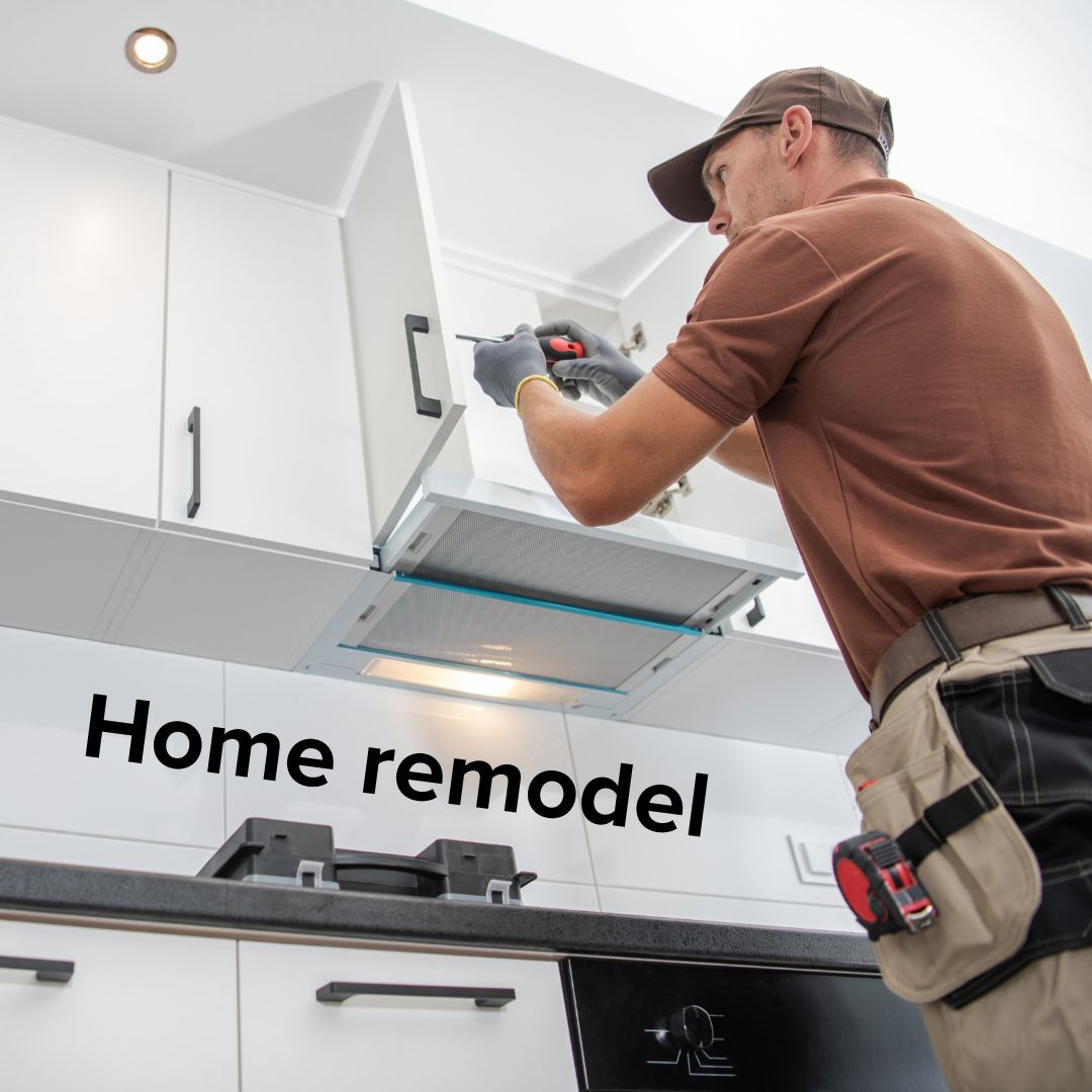 Title in black in the middle of the page: 'Home remodel.' A man installs a kitchen cabinet in a bright room.
