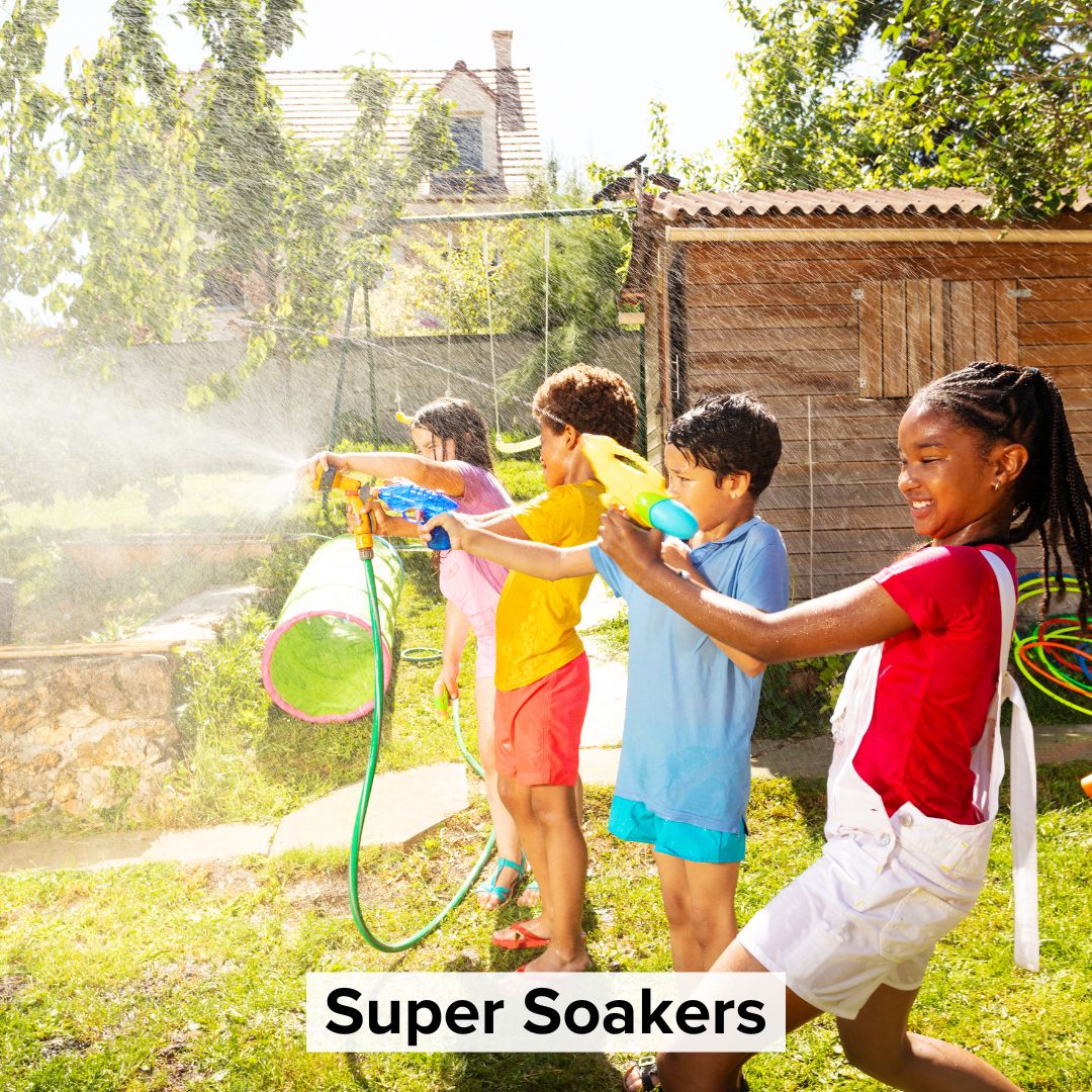 Title 'Super Soakers' in black surrounded by a lighter background toward the bottom. The image is of four children in a water fight.
