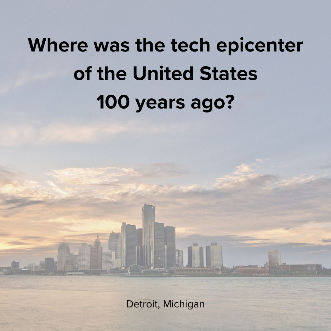 Title 'Where was the tech epicenter of the United States 100 years ago?' larger and on top. 'Detroit, Michigan' smaller and on bottom. An image of Detroit from across the water at twilight is in the background.