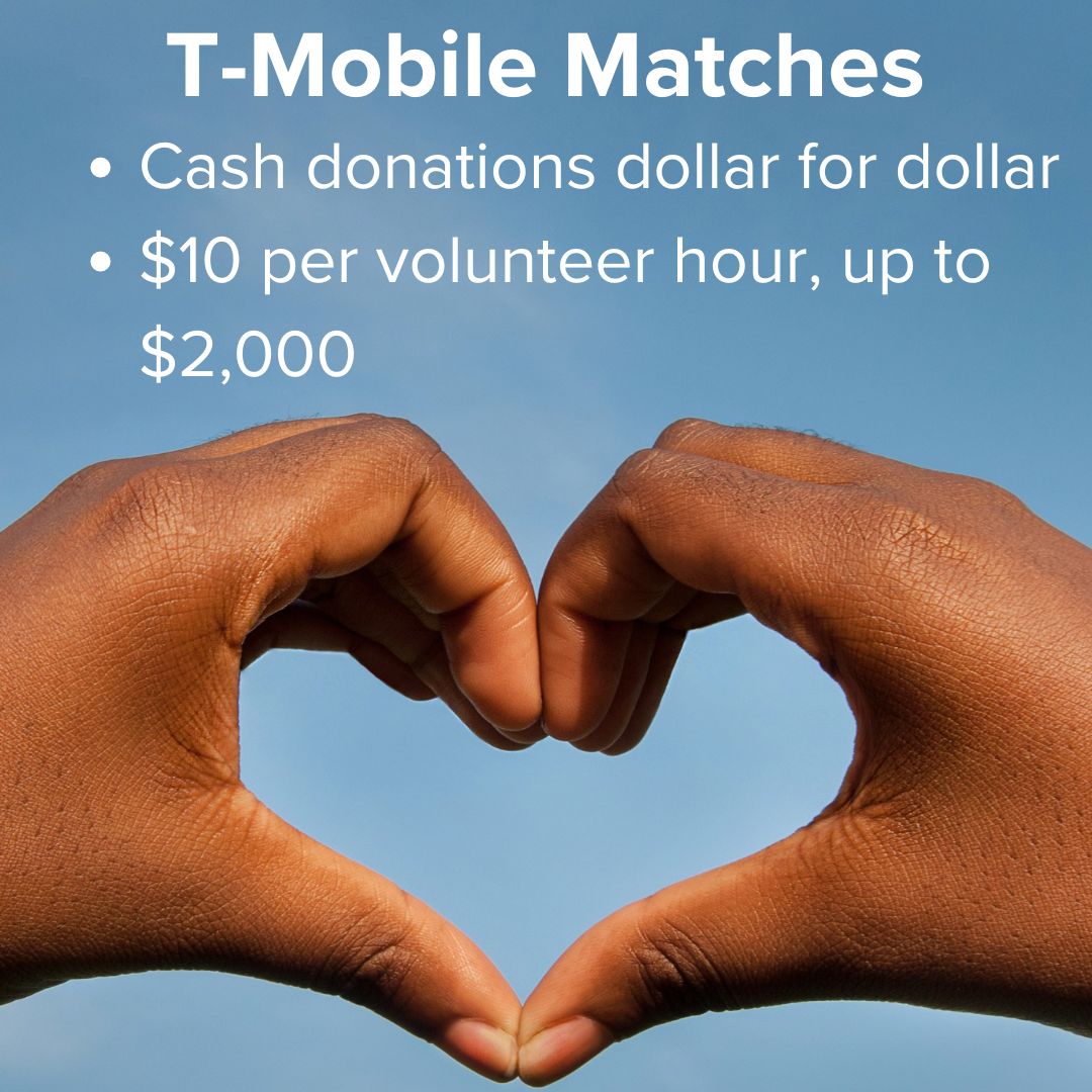 Title: 'T-Mobile Matches' in white on top. Cash donations dollar for dollar; $10 per volunteer hour, up to $2,000. The background photo is of two hands coming together in the shape of a heart in front of a blue sky.